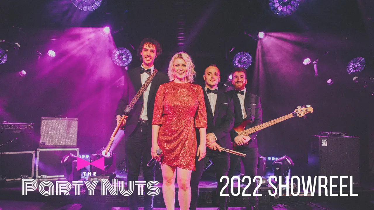 The Party Nuts band with female lead singer in red sequined dress and three male musicians in tuxedos on stage with purple lighting, 2022 showreel.